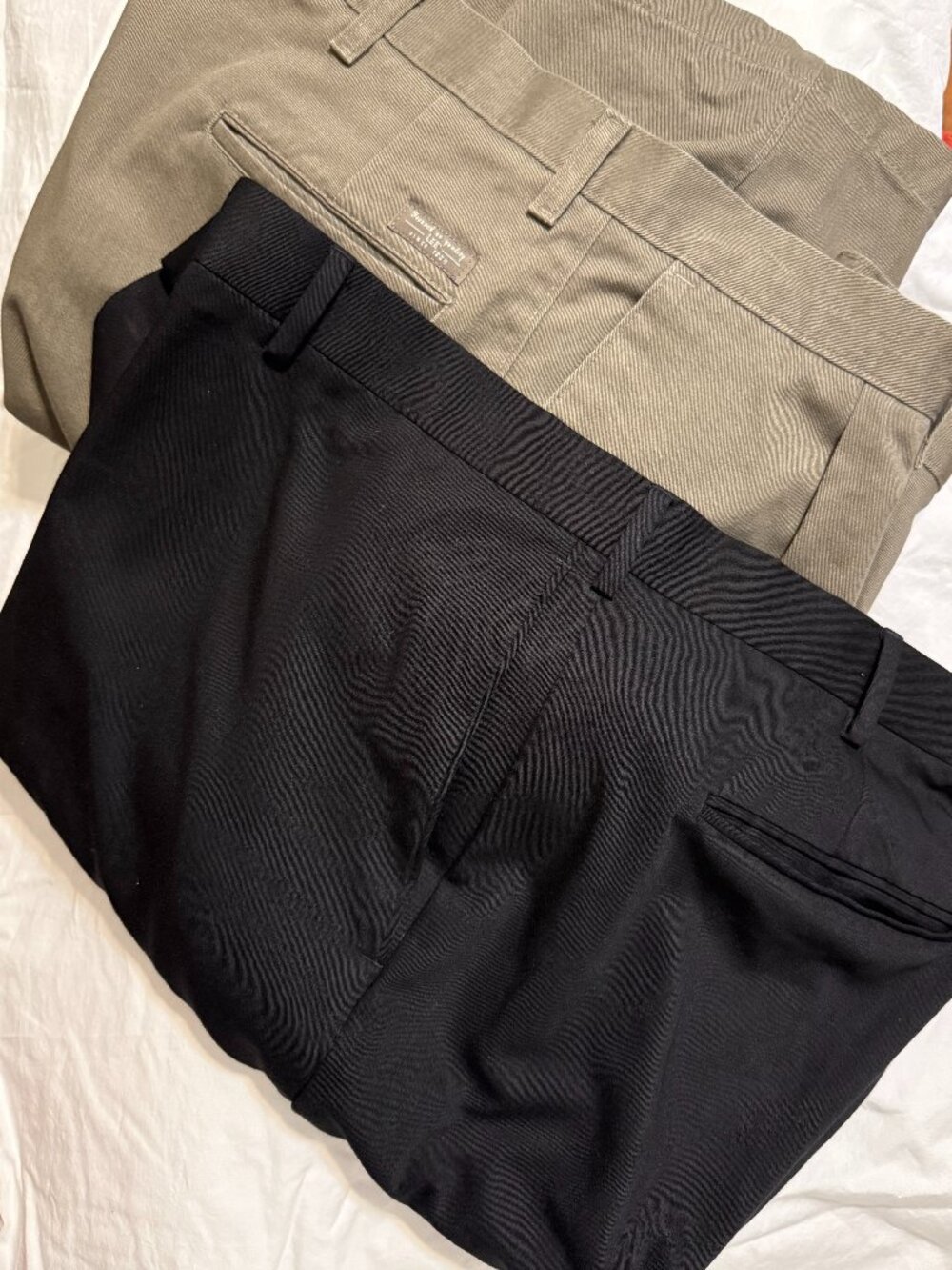 2 Pairs of Men's 44x32 Slacks- Black dress pants and Khaki Brown Color